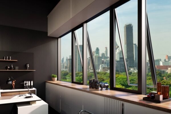 Run of aluminium windows mixing fixed lights with top-hung opening vents — the opening sashes show a visibly deeper frame than the fixed panes beside them